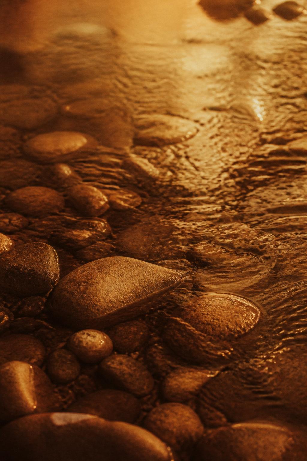 River water moving over smooth stones